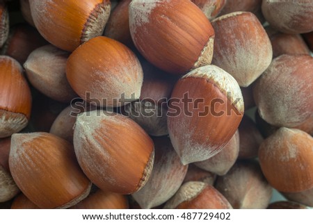 Stack of hazelnuts. Hazelnut background. Healthy eating vegetarian nut food hazelnut.