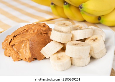 A Stack Of Healthy Banana Slices With Peanut Butter Adds Healthy Carbs To Protein For Good Weight Loss.

