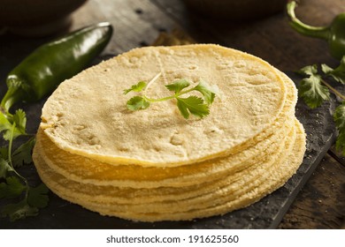 Stack of Homemade Corn Tortillas on a Background