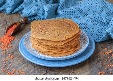 Stack Of Homemade  Vegan Red Lentil  Tortillas On Plate On Wooden Table.  Selective Focus.