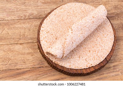 Stack Of Homemade Whole Wheat Flour Tortilla  On Wooden Table Background