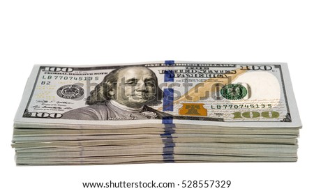Stack of hundred dollar cash banknotes isolated with focus on the bottom 100s