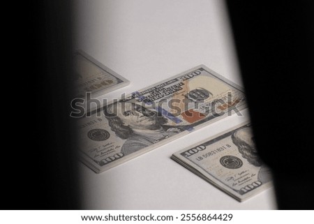 A stack of hundred-dollar bills on a white isolated background. 100 dollar bills