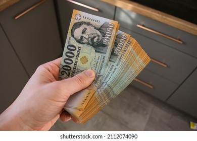 Stack of Hungarian banknotes money (forints). Europe Hungary - Shutterstock ID 2112074090