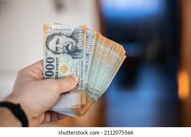 Stack of Hungarian banknotes money (forints). Europe Hungary - Shutterstock ID 2112075566