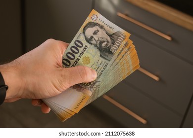 Stack of Hungarian banknotes money (forints). Europe Hungary - Shutterstock ID 2112075638