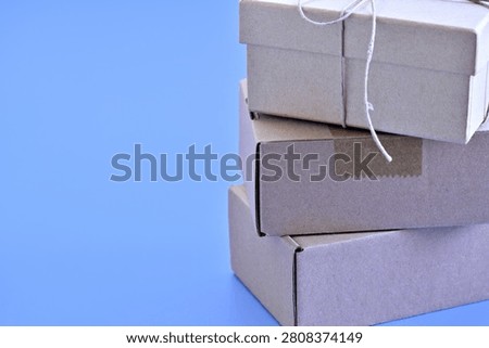 Stack of individual cardboard boxes