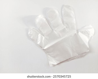 Stack of isolated transparent plastic gloves