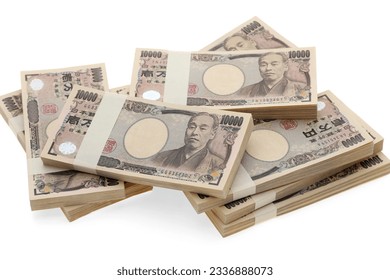 Stack of Japanese yen. 10,000 yen bundle of bills. The banknotes are written as "10,000 yen" in Japanese. 