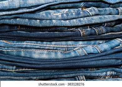 Stack of jeans. Background  fashion jeans.