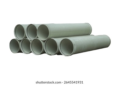 Stack of large drainage or sewer pipes is isolated.