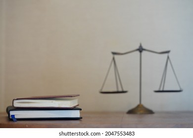 Stack Of Law Books And Blur Justice Scale In Gradient White And Brown Wall For Design Business Or Education Or Legal Concept Background, Book Stack