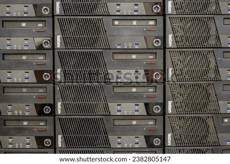 stack of Lenovo ThinkCenter desktop computers. IT Asset Management. 