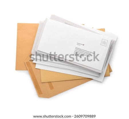 Stack of letters on white background