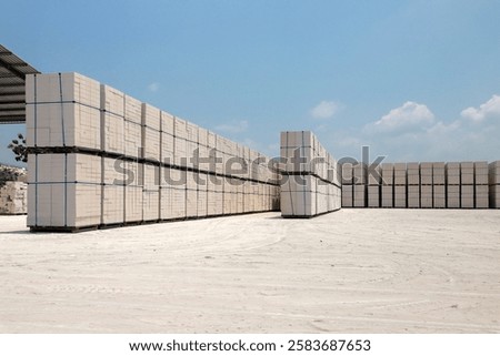 A stack of the lightweight bricks or hebel ready to be delivered for construction materials.