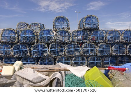 Stack of lobster pot and material for the industrial fishing at Le Croisic, a commune in the Loire-Atlantique department in western France