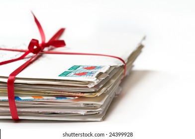 Stack Of Love Letters With A Red Ribbon