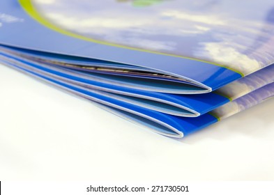 Stack Of Magazines, Brochures, Isolated On A White Background.