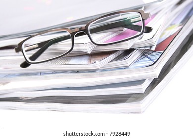 stack of magazines isolated on white