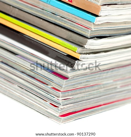 Stack of magazines isolated on white