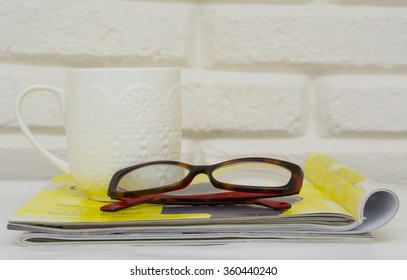 Stack of magazines on table, close up