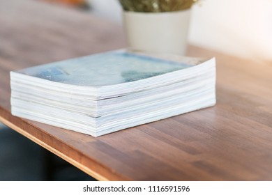 Stack of magazines on table living room