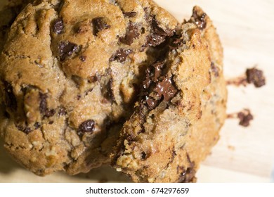 Stack Of Melted Gooey Chocolate Chip Cookies For Dessert With Milk