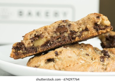 Stack Of Melted Gooey Chocolate Chip Cookies For Dessert With Milk