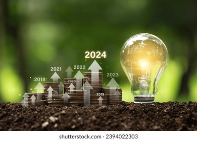 Stack of money with an arrow icon increasing future company growth 2024 planning opportunities challenges, saving and managing to success business,2024 Investment Environment target of Green business.