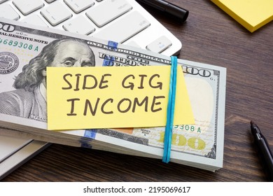 A stack of money and an inscription Side gig income on it. - Shutterstock ID 2195069617