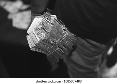 Stack of money in someones hands