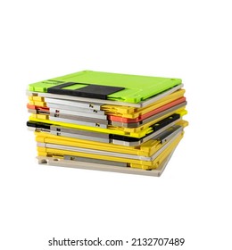 stack of multi-colored diskettes on white background. Colored floppy disks. copy space.