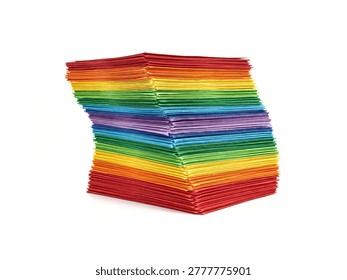 Stack of multicolored paper isolated on white background.