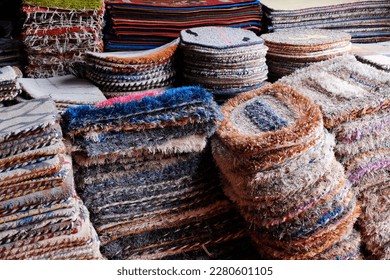 Stack of multicolored quality rugs at carpet shop, Carpets variety selection rolled up rugs shop store. - Shutterstock ID 2280601105