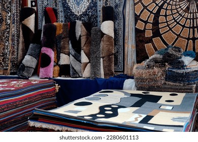 Stack of multicolored quality rugs at carpet shop, Carpets variety selection rolled up rugs shop store. - Shutterstock ID 2280601113