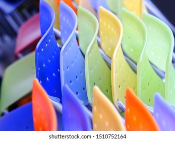 Stack of multicolors chairs. Bright and fresh colors. 