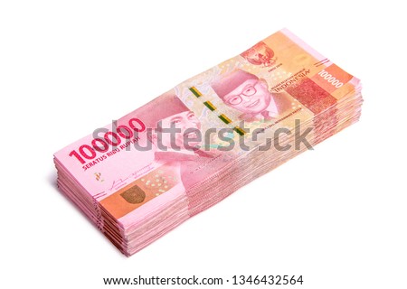 A stack of new 100.000 IDR (Indonesian Rupiah) bills, isolated on white background