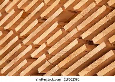 Stack Of New Wooden Studs At The Lumber Yard