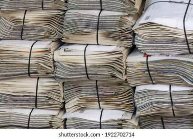 a stack of newspapers in closeup