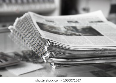 Stack Of Newspapers On The Newspaper Stand, Close Up