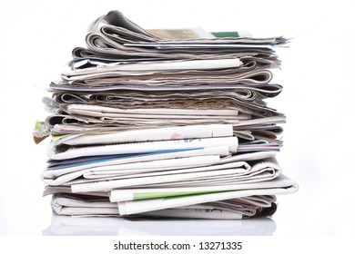 Stack Of Newspapers On White Background.