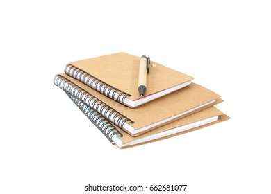 Stack for notebook and pen isolated on white background.