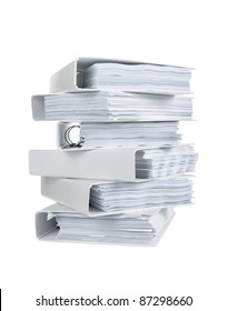 Stack of office ring binders in isolated white