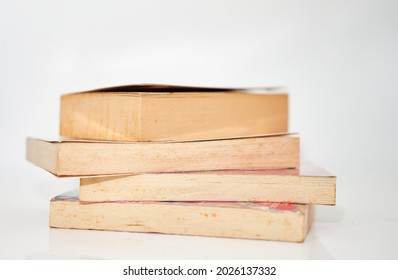 stack of old books isolated on white background