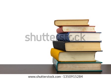 Stack of old books on shelf book on White background with clipping Path.Education learning and reading concept.
