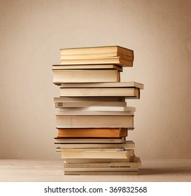 A Stack Of Old Books With Vintage Background