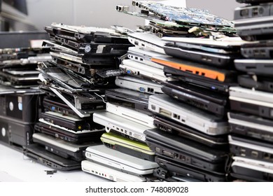 Stack of old, broken and obsolete laptop pc computer for repair and recycle