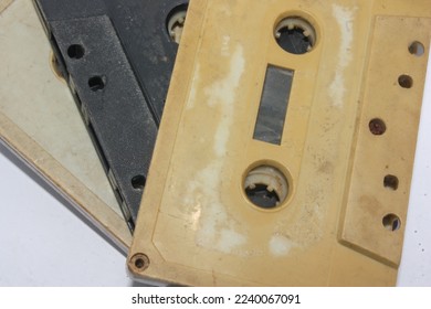 Stack of the old cassette tape in three different colour