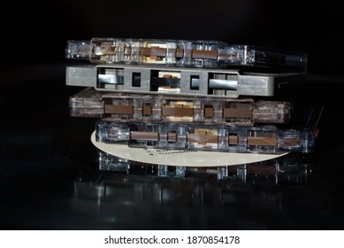 A stack of old cassettes on a record