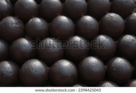 Stack of old iron cannon balls Monaco.